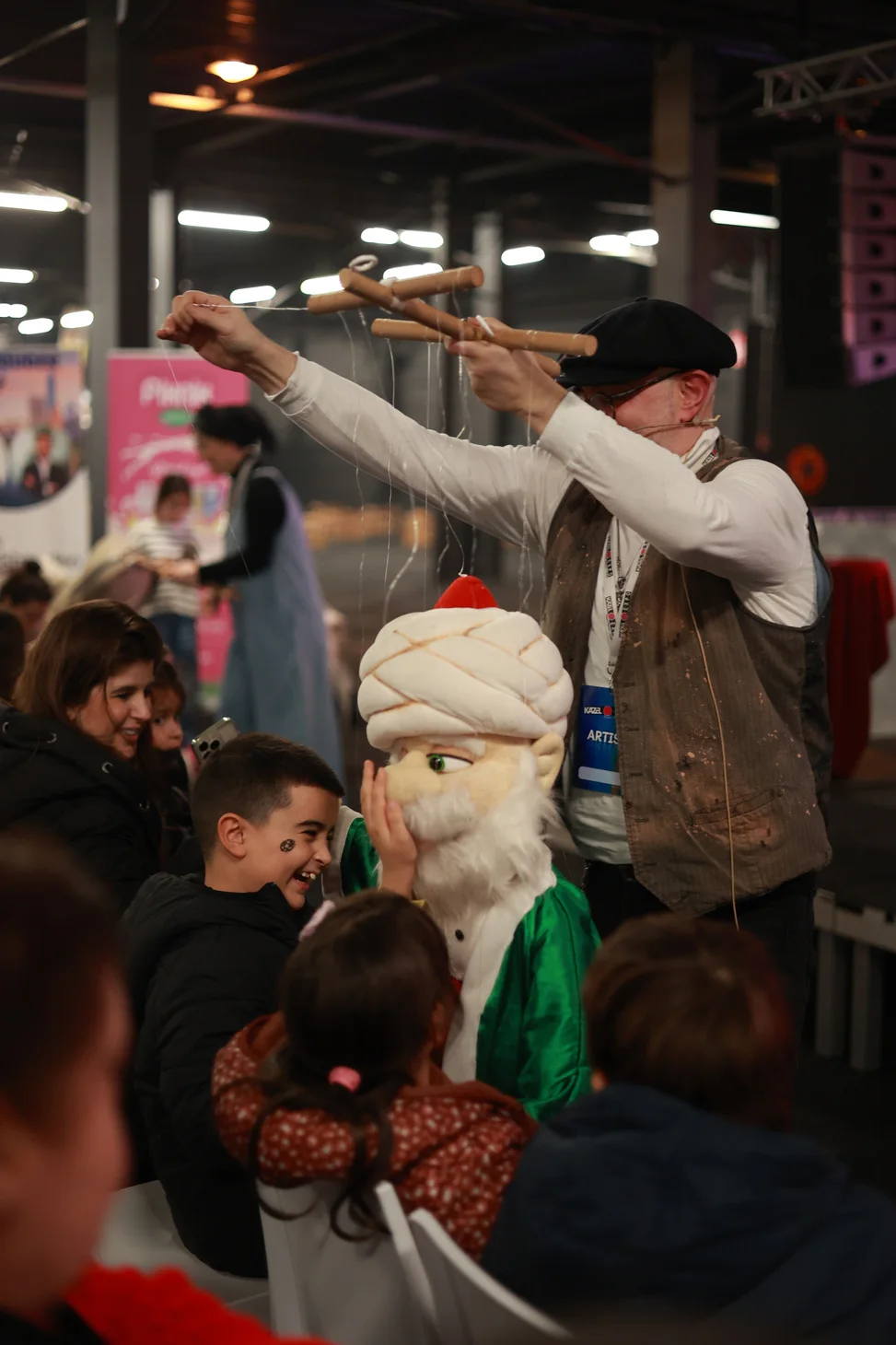 Children enjoying a performance at Kazel Expo